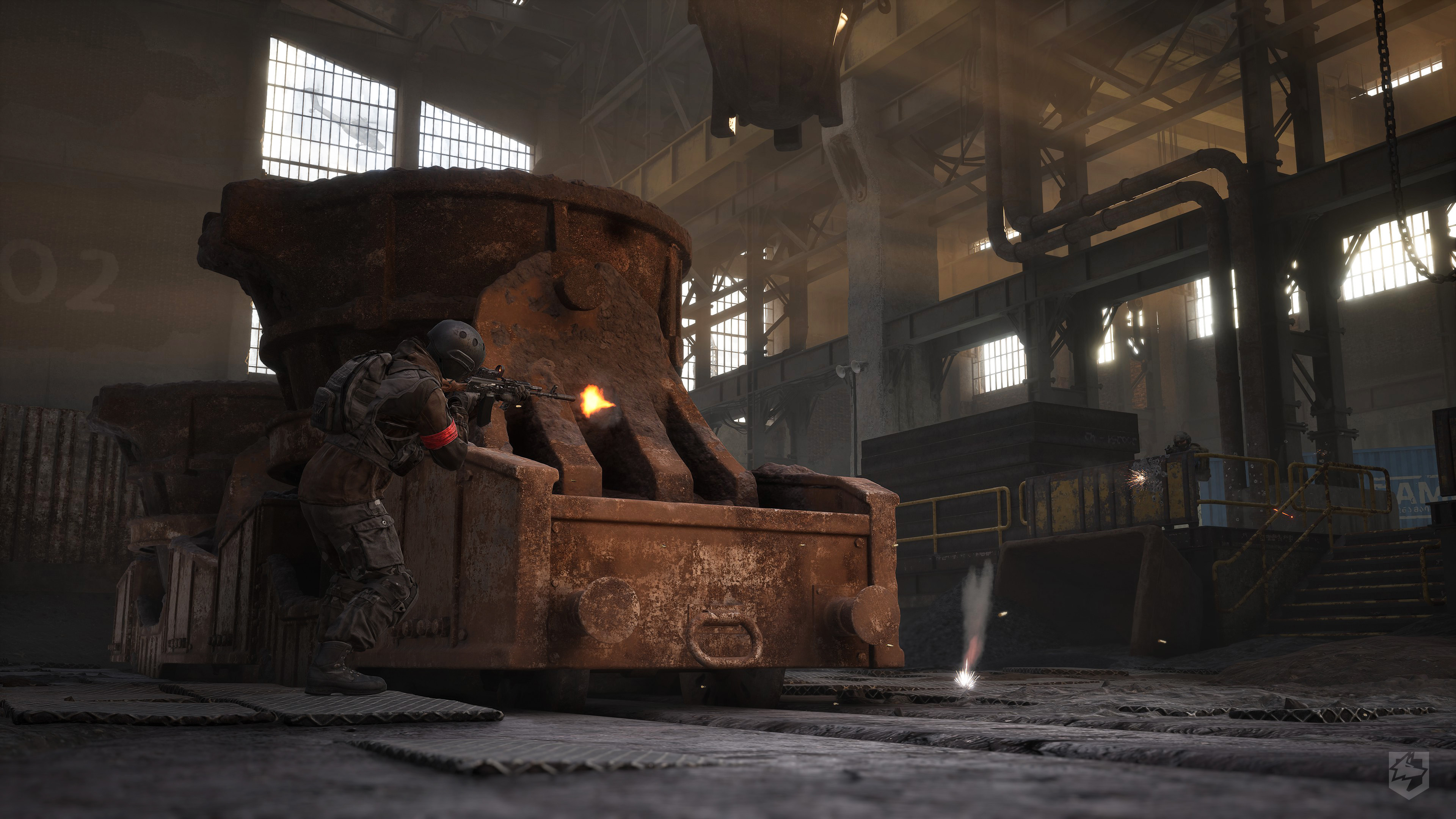 Official WARDOGS scene showing soldiers and structures in an industrial foundry environment